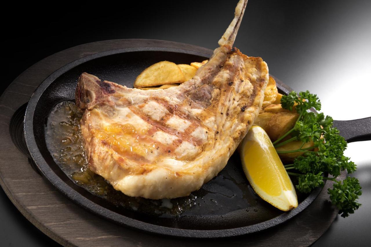 Hewitt Resort Naha Exterior photo A grilled pork chop