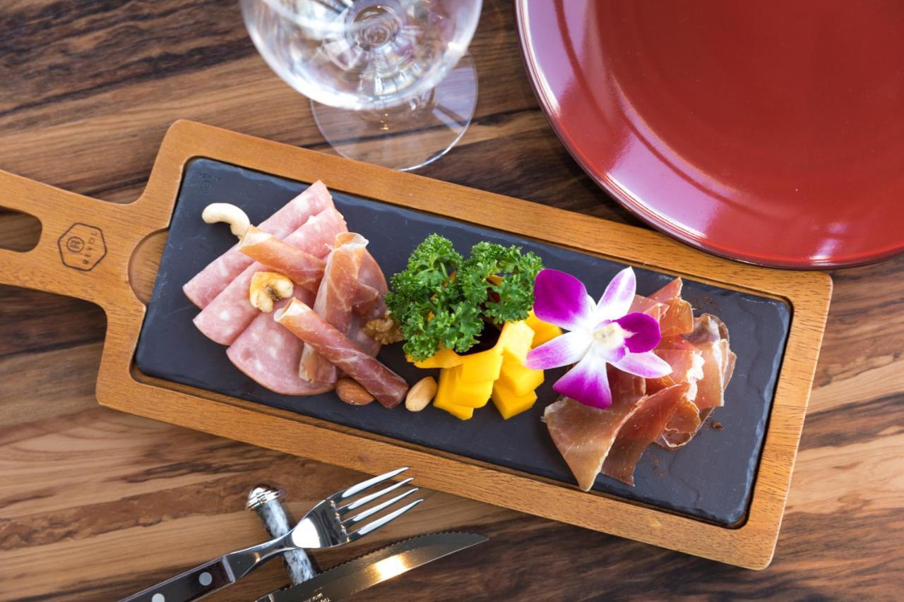 Hewitt Resort Naha Exterior photo A serving of cured meat