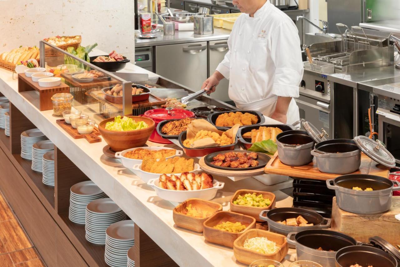 Hewitt Resort Naha Exterior photo A buffet at a hotel